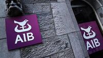 FILE PHOTO: Signage and logo are seen on an AIB bank building in Galway