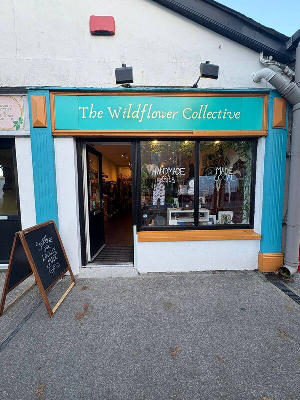 The Wildflower Collective shop on Broderick Street, Midleton. Inset is Virg Laveau with her dog Manny outside the store.