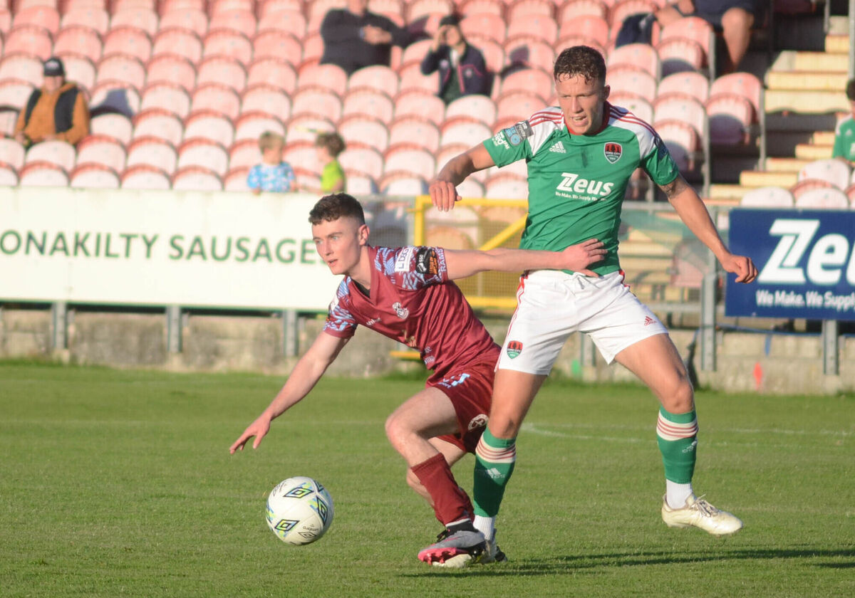 Cobh Ramblers' Liam Kervick trying to hold off Cork City's Colin Henderson. Picture: Howard Crowdy Cobh Ramblers' Liam Kervick trying to hold off Cork City's Colin Henderson. Picture: Howard Crowdy