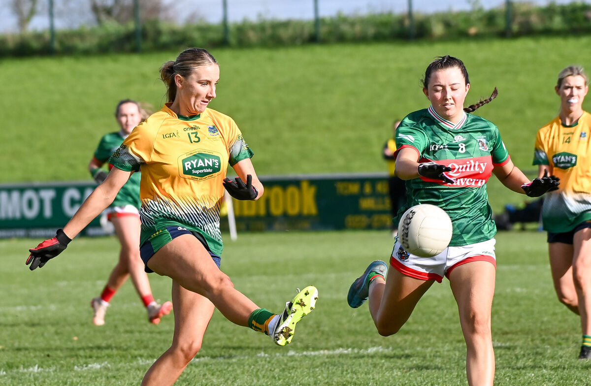 Glanmire's Orlaith Roche scores a point as Kilmurry Ibrickane's Sophie Daly closes in. Picture: David Keane.