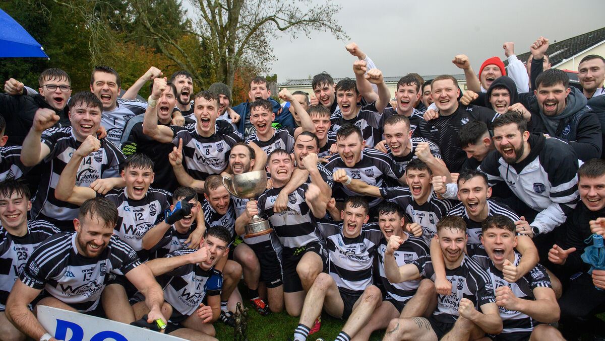  The Donoughmore team celebrate their win in the Ross Oil Junior A football final replay at Macroom. Picture: Dan Linehan