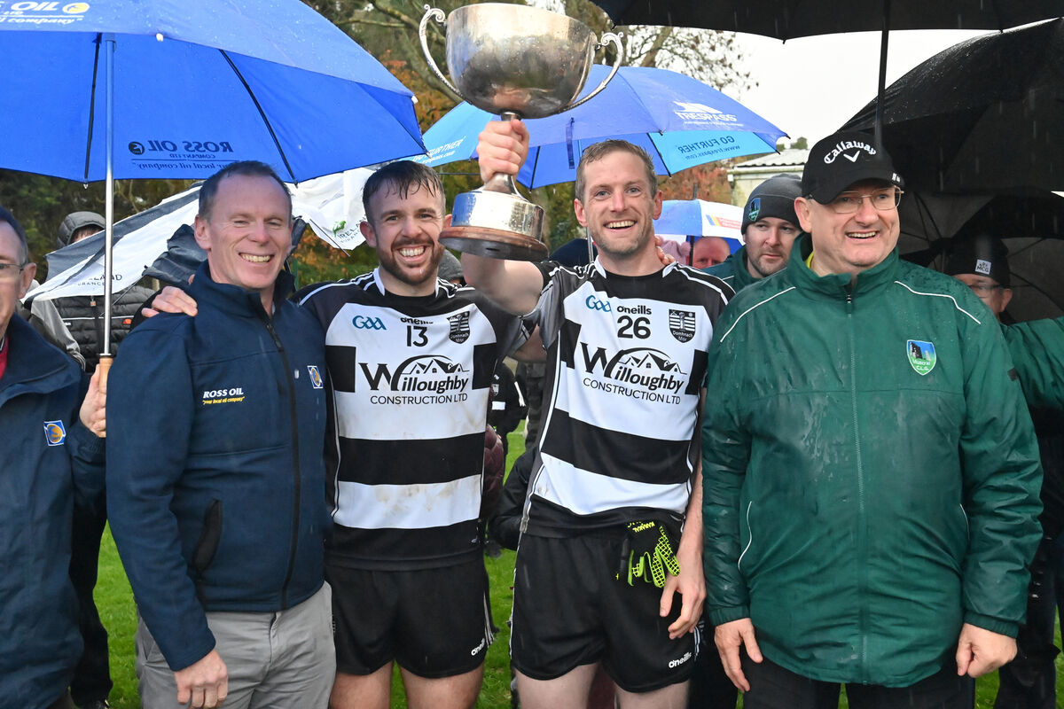  Donoughmore joint captains Declan Keating and Daniel Forde holding the trophy aloft. Picture: Dan Linehan