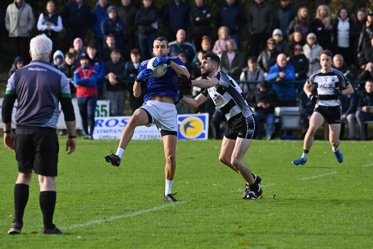  Matthew McCarthy, Aghinagh wins this ball from Mark Lucey, Donoughmore. Picture Dan Linehan