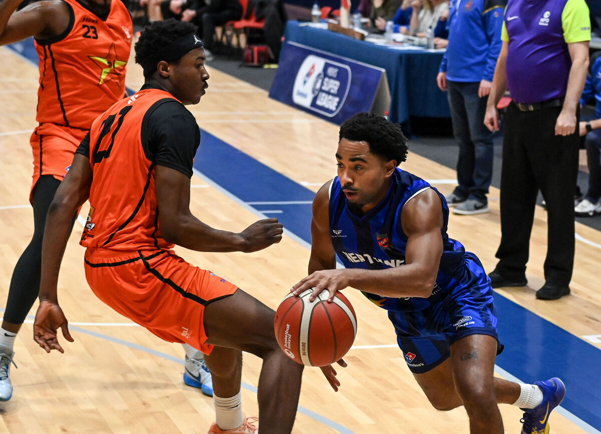 Neptune's Cameron Glover drives past Sligo's Timi Tolu Ogunkoya. Picture: David Keane. Neptune's Cameron Glover drives past Sligo's Timi Tolu Ogunkoya. Picture: David Keane.