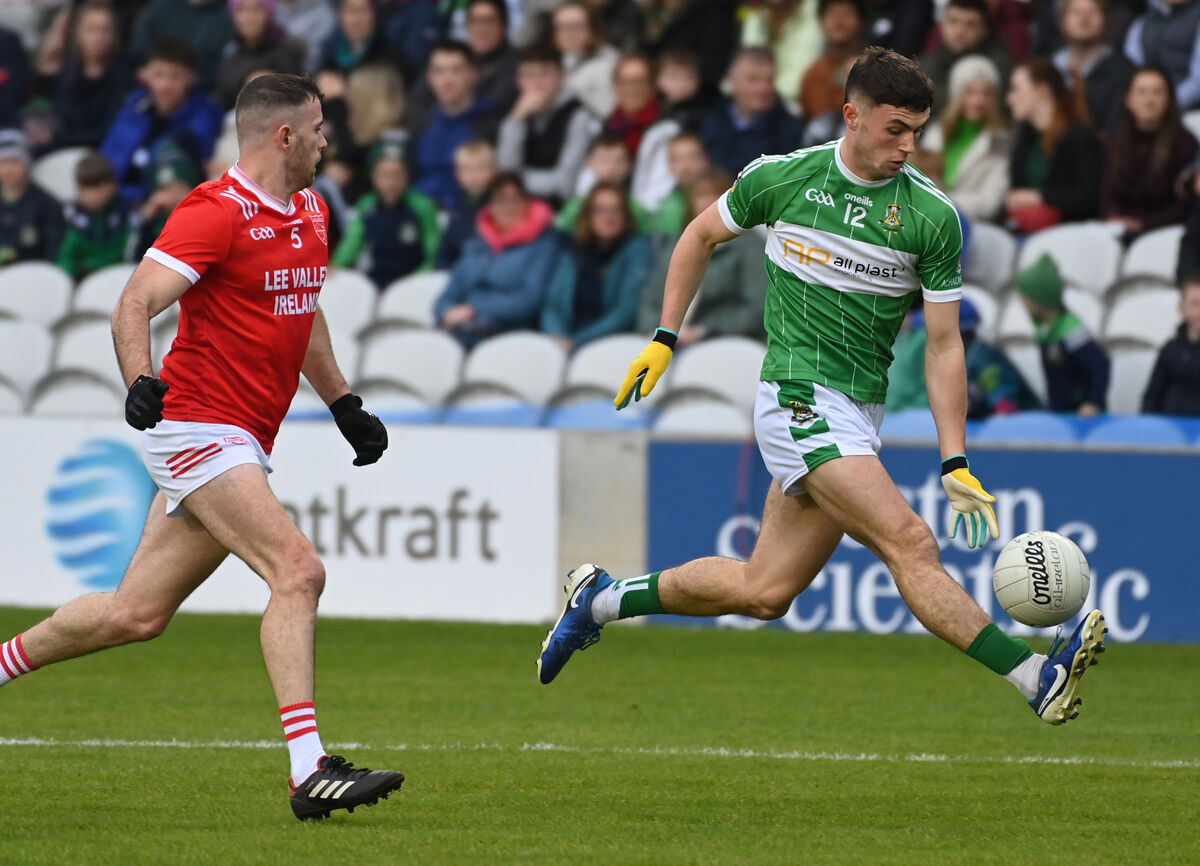 Aghabullogue's Pauric O'Sullivan solo's past Uibh Laoire's Kevin Manning. Picture: Eddie O'Hare