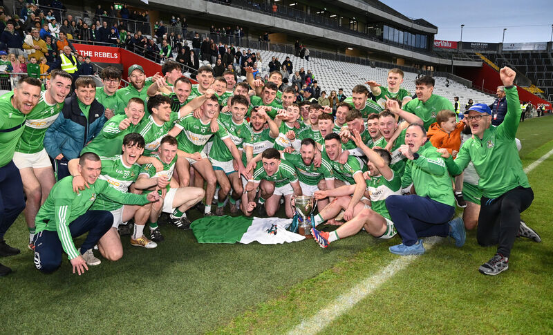 Aghabullogue players and mentors celebrate after defeating Uibh Laoire. Picture: Eddie O'Hare Aghabullogue players and mentors celebrate after defeating Uibh Laoire. Picture: Eddie O'Hare