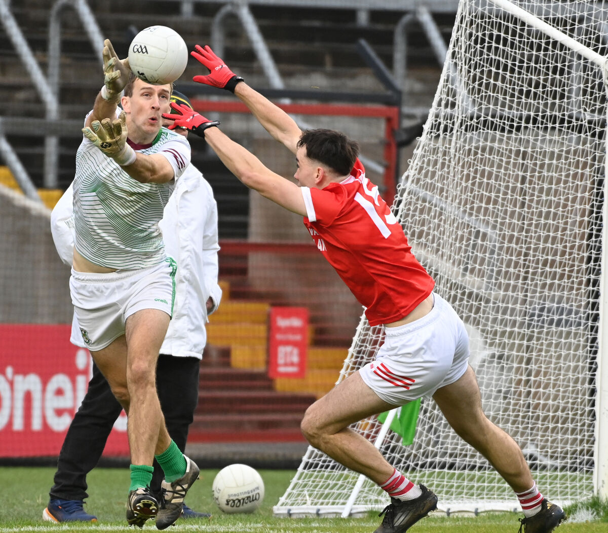 Aghabullogue goalkeeper John Buckley gets off his pass from Uibh Laoire's Ian Jones. Picture: Eddie O'Hare