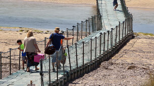 <p> Families crossing the pontoon as they head to the beach at Barleycove in West Cork. Picture Dan Linehan</p> <p> Families crossing the pontoon as they head to the beach at Barleycove in West Cork. Picture Dan Linehan</p>