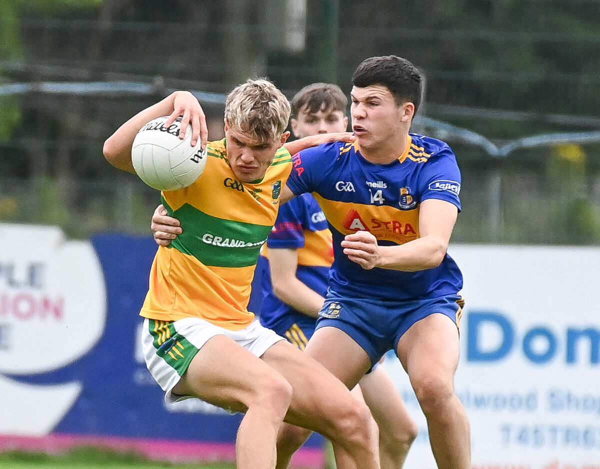  Glanmire's Harry Cogan battles with Carrigaline's Jack Connolly. Picture: David Keane