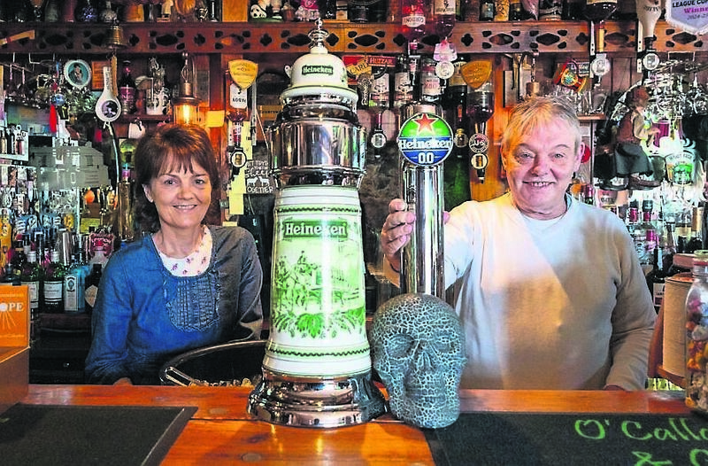 Eileen (Nell) Martin and Patrick (Pods) O’Callaghan behind the bar at O’Callaghans Bar & Guesthouse in Coachford, which is situated in the main street (right).  Eileen (Nell) Martin and Patrick (Pods) O’Callaghan behind the bar at O’Callaghans Bar & Guesthouse in Coachford, which is situated in the main street (right).