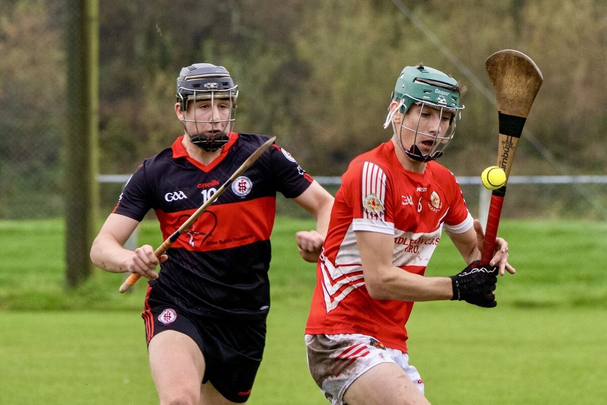 High School Clonmel's Mikey McGuire stretches to hook Midleton's Colm Garde. Picture Chani Anderson. High School Clonmel's Mikey McGuire stretches to hook Midleton's Colm Garde. Picture Chani Anderson.