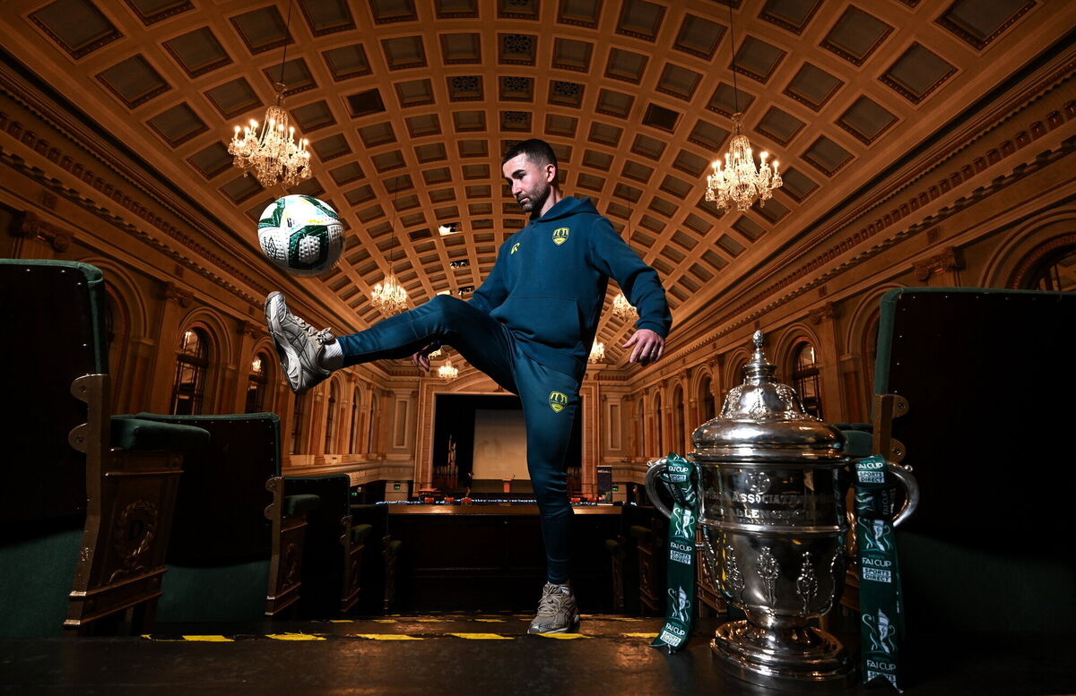 Seani Maguire poses for a portrait with the Sports Direct FAI Cup during a Cork City media conference. Picture: Brendan Moran/Sportsfile