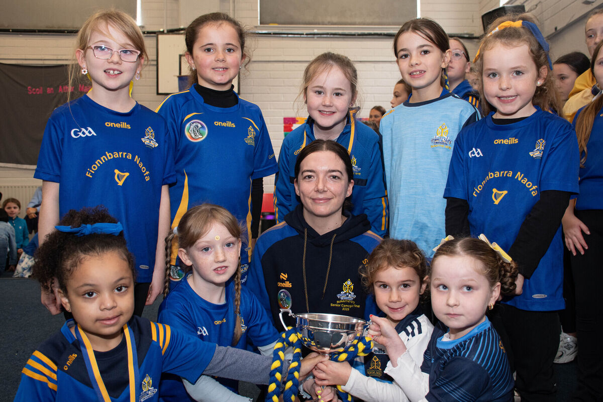 St Finbarr's senior camogie team captain Stephanie Punch with some of the pupils from infants classes in Togher Girls NS. St Finbarr's senior camogie team captain Stephanie Punch with some of the pupils from infants classes in Togher Girls NS.