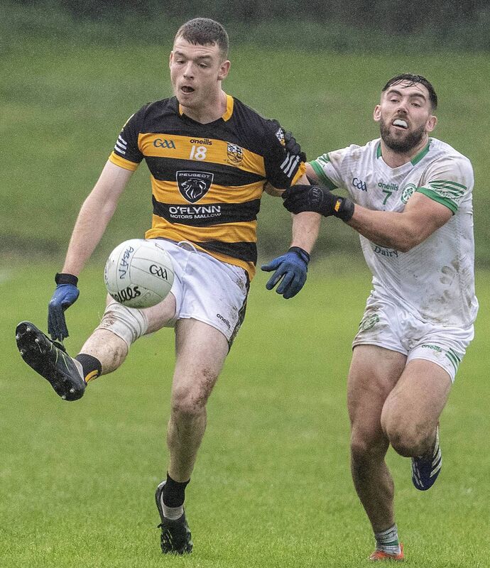 Buttevant's Kevin Sheehan shoots from Shamrocks' Adam Crawford during the Munster Club Junior Football match at Fraher Field. Picture: Sean Byrne Buttevant's Kevin Sheehan shoots from Shamrocks' Adam Crawford during the Munster Club Junior Football match at Fraher Field. Picture: Sean Byrne