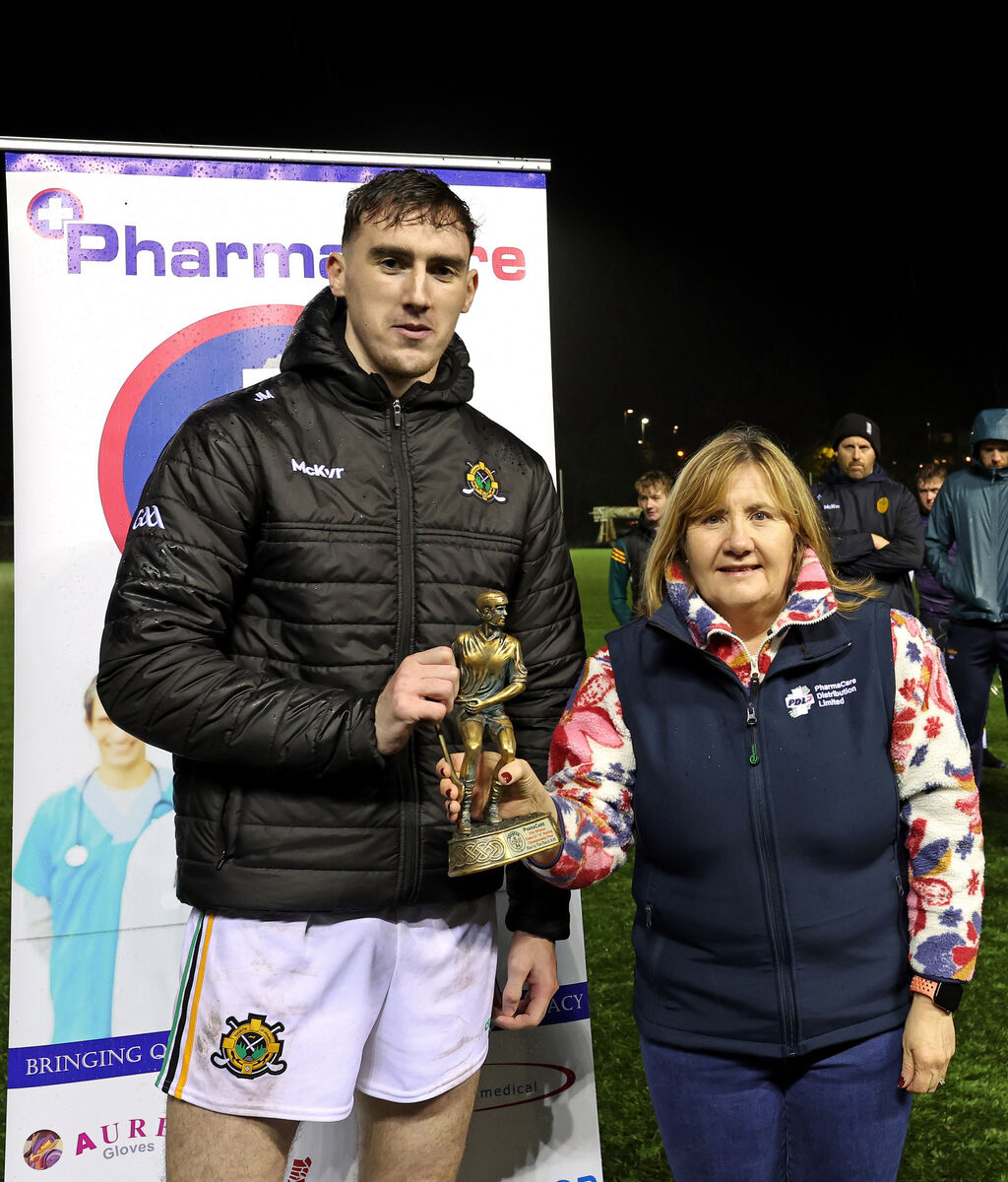 Eoin O'Leary, Glen Rovers, receives the Player of the Match from Liz Farr, Pharmacare. Picture: Jim Coughlan. Eoin O'Leary, Glen Rovers, receives the Player of the Match from Liz Farr, Pharmacare. Picture: Jim Coughlan.