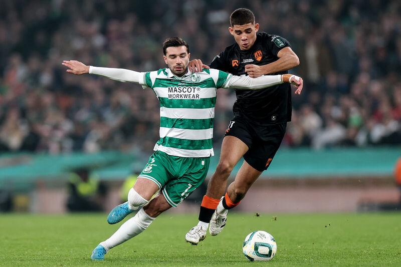 Shamrock Rovers' Danny Mandroiu is tackled by Cathal O'Sullivan of Cork City during the FAI Cup final. Picture: ©INPHO/Ben Brady