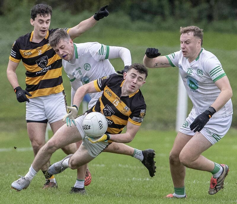 Buttevant's Aaron Horgan is tackled by Shamrocks' Edward Lonergan and Tom Dalton. Picture: Sean Byrne Buttevant's Aaron Horgan is tackled by Shamrocks' Edward Lonergan and Tom Dalton. Picture: Sean Byrne