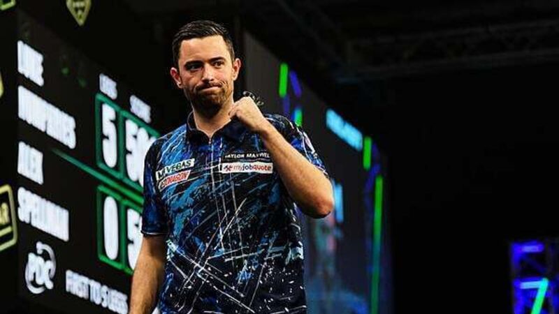 Luke Humphries hits nine-darter to beat Michael Smith at Grand Slam of Darts