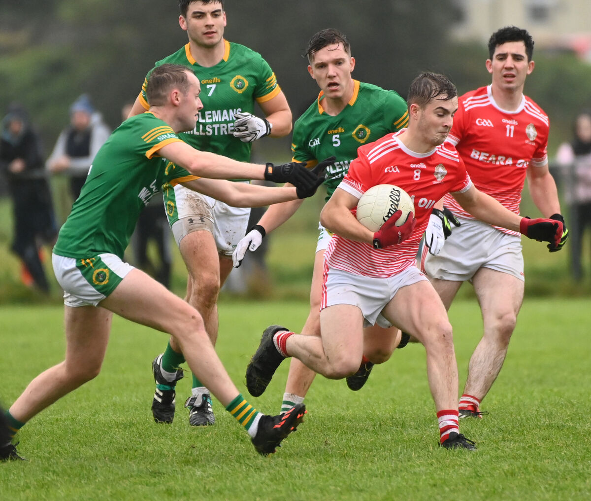 Urhan's Alan Elphick breaks from Millstreet's Alan Murphy and Darragh Cashman. Picture: Eddie O'Hare Urhan's Alan Elphick breaks from Millstreet's Alan Murphy and Darragh Cashman. Picture: Eddie O'Hare