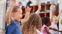 Shot of a group of children sitting in class