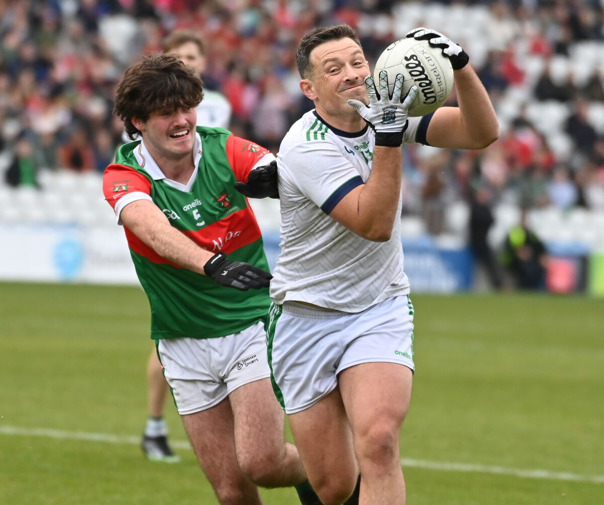 Ilen Rovers' Dan MacEoin wins the ball from Ballinora's Danny Dineen. Picture: Eddie O'Hare