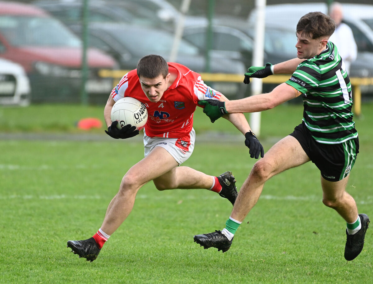 Beara's Danny Walsh is tackled by Douglas's Eoin O'Flynn. Picture: Eddie O'Hare