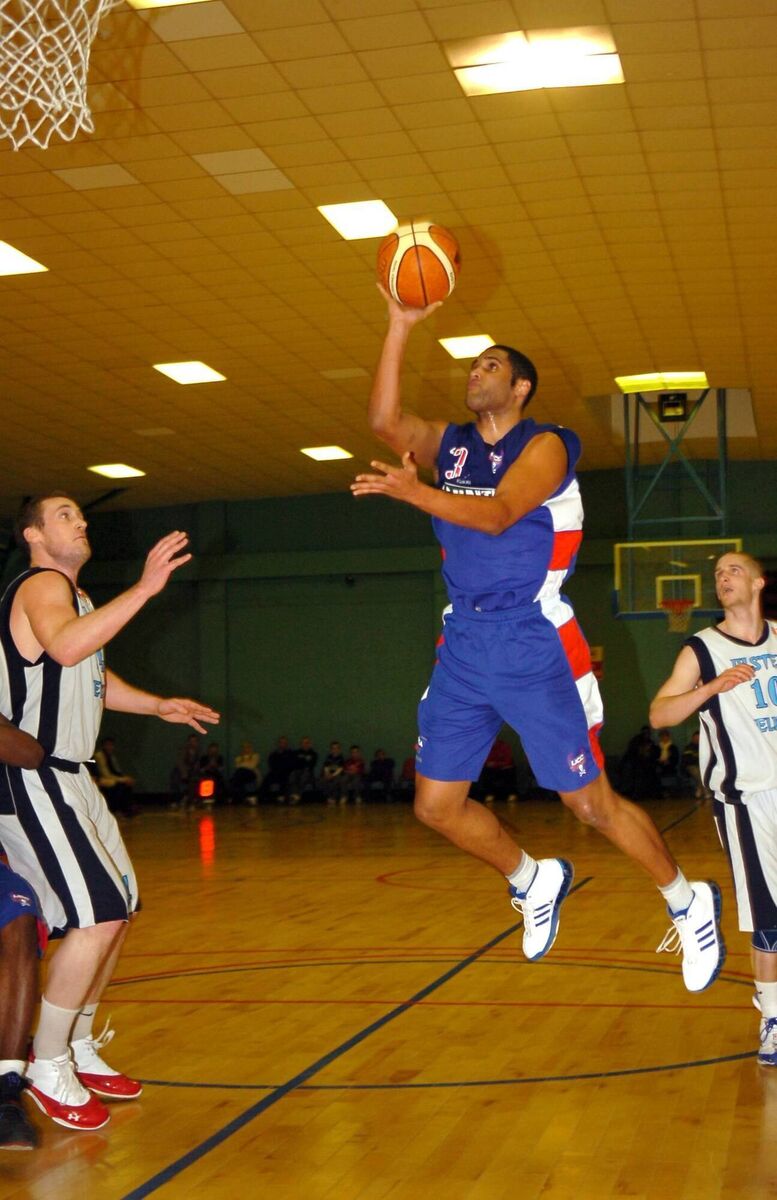 UCC Demons' Carleton Cuff going for a score against Ulster Elks' David Neal. Picture: Richard Mills.
