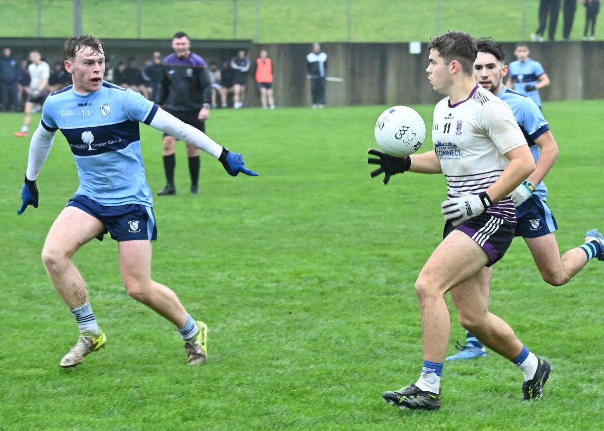 Danny O'Donovan of Skibbereen looking at his options as Conrad Murphy of Clonakilty provides an obstacle in Rosscarbery. Picture: Martin Walsh