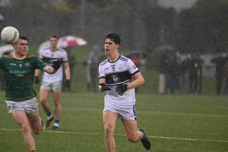 Colm Herlihy works the ball out from of defence for Coláiste Choilm. Picture: Larry Cummins