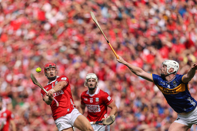 Cork's Alan Connolly tries to get a shot away as Tipperary's Michael Breen closes in during July's All-Ireland SHC final. Picture: Inpho/Bryan Keane
