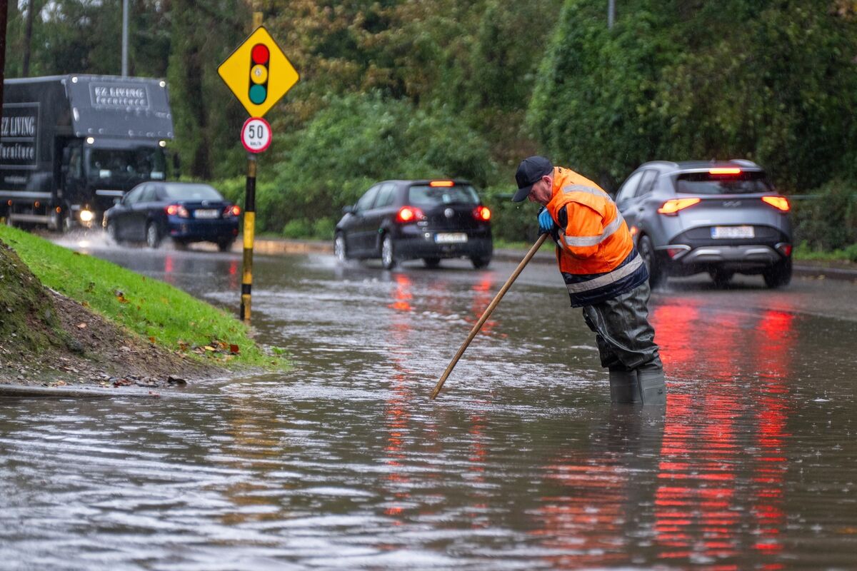 Cork City Council workers attempt to clear blocked drains on the Rochestown Road, where heavy rainfall once again caused severe flooding. Cork City Council workers attempt to clear blocked drains on the Rochestown Road, where heavy rainfall once again caused severe flooding.