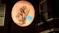 Plaque for Alice In Wonderland illustrator reinstalled after 65 years in storage