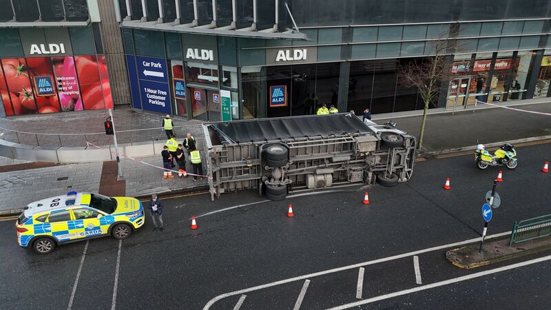  Overturned rigid truck went over onto the footpath outside Aldi at The Elysian, Cork on Thursday picture: Larry Cummins