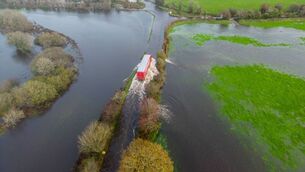 <p>An articulated truck makes its way through the floods at Ardcahan bridge. For the second time in eight days the main Dunmanway to Macroom road R587 was impassable at Ardcahan bridge due to flooding. Picture; David Patterson.</p> <p>An articulated truck makes its way through the floods at Ardcahan bridge. For the second time in eight days the main Dunmanway to Macroom road R587 was impassable at Ardcahan bridge due to flooding. Picture; David Patterson.</p>