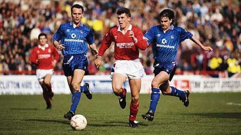 Roy Keane shares passport photo from beginning of his career