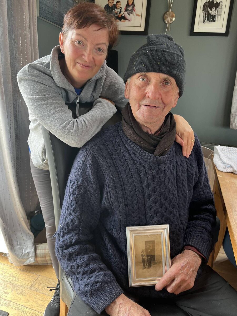Paddy McCarthy pictured with his daughter Mary. Paddy is holding a photograph of his father Jeremiah with Philomena. Picture: Aisling Meath
Paddy McCarthy pictured with his daughter Mary. Paddy is holding a photograph of his father Jeremiah with Philomena. Picture: Aisling Meath