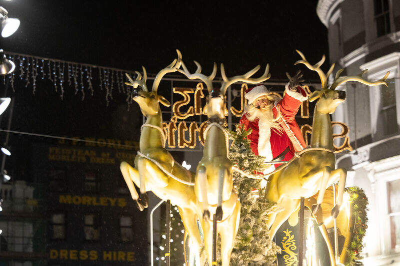 Santa Waving to the crowd at the Corkmas Christmas Parade. Santa Waving to the crowd at the Corkmas Christmas Parade.