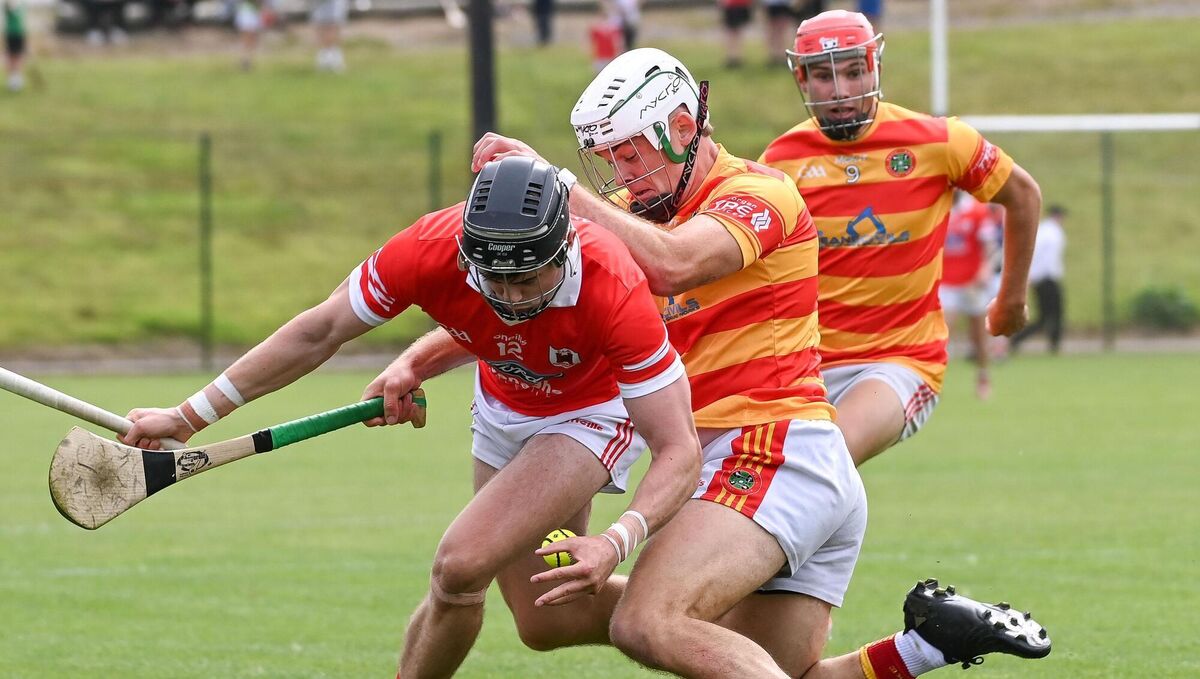 Charleville's Darragh Fitzgibbon wins possession under pressure from Newcestown's Gearoid O'Donovan, during their Premier SHC clash at Grenagh. Picture: David Keane.