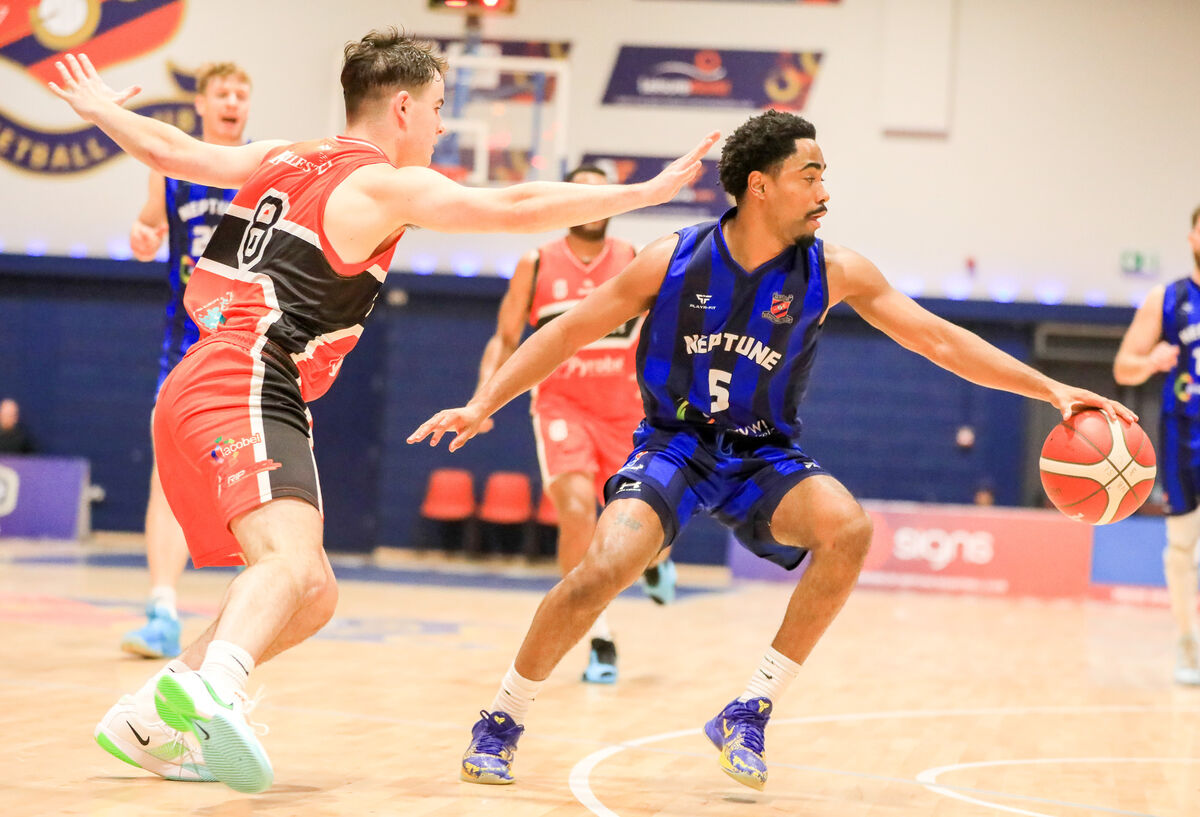 Neptune's Cameron Glover tries to get past Killester's Daniel Sheridan. Picture: David Creedon Neptune's Cameron Glover tries to get past Killester's Daniel Sheridan. Picture: David Creedon