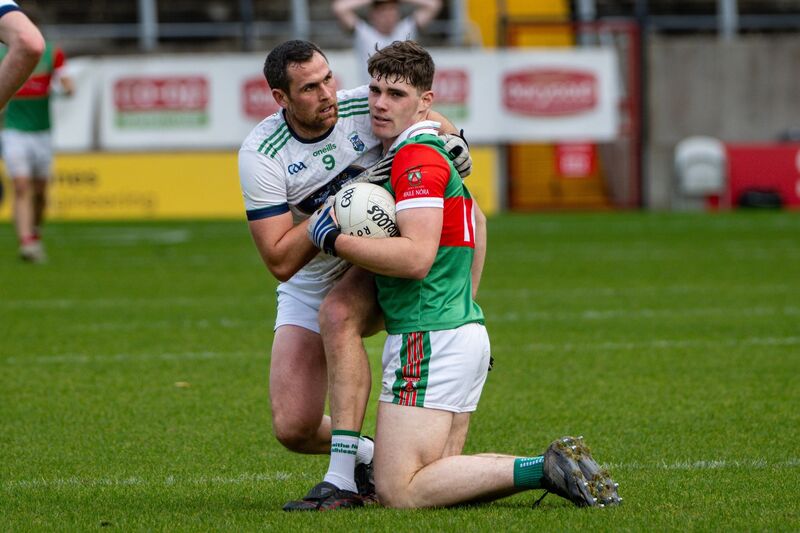 Ilen Rovers’ Peadar O’Driscoll and Ballinora’s Shane Kingston show great sportsmanship after colliding. Picture: Chani Anderson Ilen Rovers’ Peadar O’Driscoll and Ballinora’s Shane Kingston show great sportsmanship after colliding. Picture: Chani Anderson