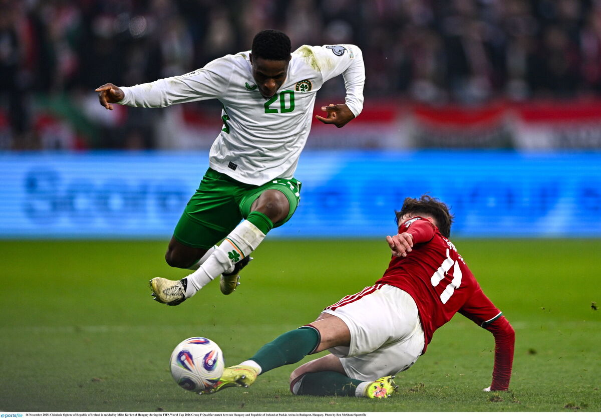 Chiedozie Ogbene of Republic of Ireland is tackled by Milos Kerkez of Hungary. Picture: Ben McShane/Sportsfile