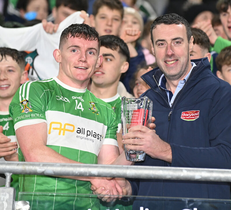 Fintan McSweeney, Co Op Superstores, presents the Man of the Match award to Matthew Bradley. Picture: Eddie O'Hare