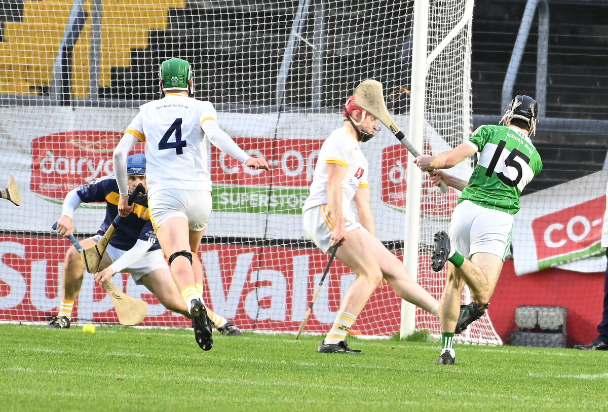 Aghabullogue's James Lane hammers home the first goal past Bandon's Pat Barry. Picture: Eddie O'Hare