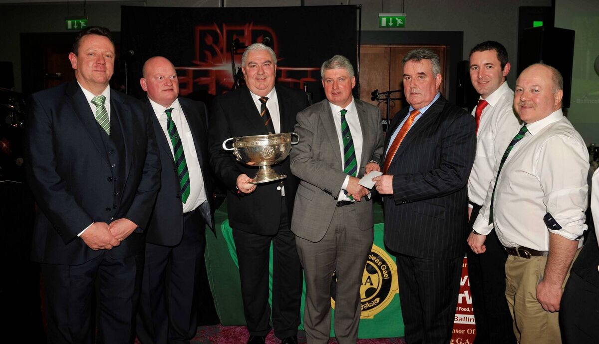Barry Down making a sponsorship presentation to Seamus O'Callaghan, chairman Ballincollig GAA, at the club's victory dinner in 2015 County Football Championship Victory Dinner. Included are Kevin Murphy, Ger O'Donovan, Crossmaglen legend Joe Kernan, Eoghan O'Callaghan and Richard Hickey. Picture: Mike English
