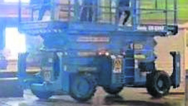 <p>The stolen scissor lift being driven near Oliver Plunkett Street.</p> <p>The stolen scissor lift being driven near Oliver Plunkett Street.</p>