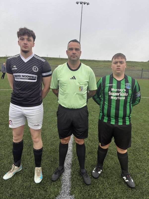 Youth Soccer: Watergrasshill United captain Alex Cronin, referee Jason Creamer and Mayfield United captain Darragh O’Flynn before their U19 League 1A game at Mayfield Park. Youth Soccer: Watergrasshill United captain Alex Cronin, referee Jason Creamer and Mayfield United captain Darragh O’Flynn before their U19 League 1A game at Mayfield Park.
