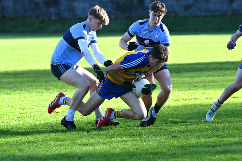 Clonakilty Community College players Michael Collins and Jack Byerley put pressure on Ruadhán McKenna of De La Salle College, Macroom. Picture: Dan Linehan Clonakilty Community College players Michael Collins and Jack Byerley put pressure on Ruadhán McKenna of De La Salle College, Macroom. Picture: Dan Linehan