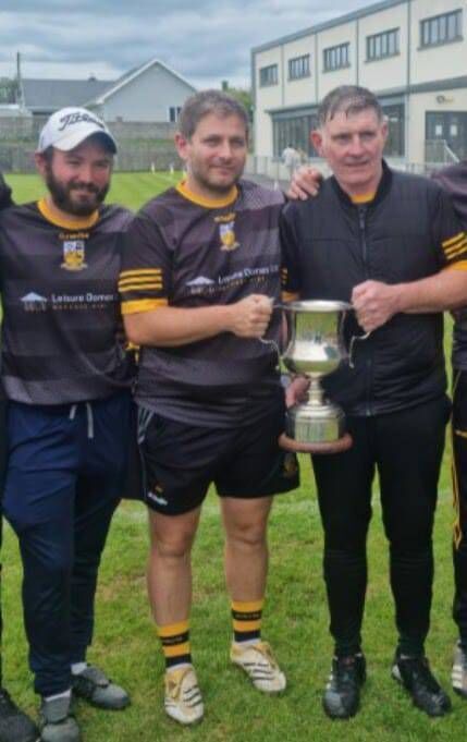 The late Miah Ahern on the left after Buttevant won the Avondhu JAFC in 2022.