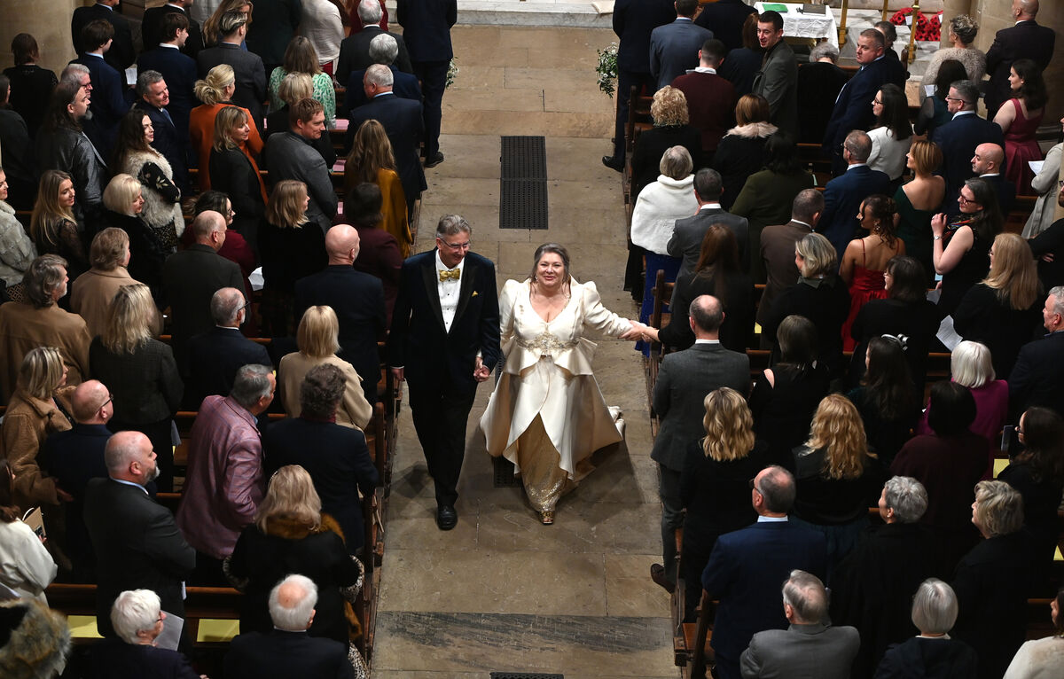  The newly married couple, The Very Reverend Nigel Dunne, Dean of Cork and Mrs Sonya Dunne (nee Keogh) walk down the aisle together as husband and wife after their marriage service and nuptial choral eucharist at St Fin Barre's Cathedral, Cork on Saturday 15th November 2025. Picture: Larry Cummins