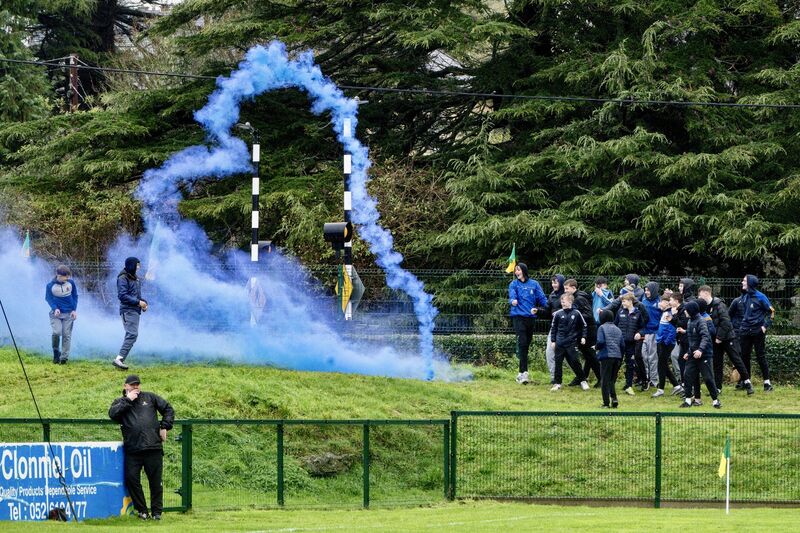 The bank turns blue as supporters celebrate the win for St Finbarr's against Clonmel Commercials. Picture: Chani Anderson